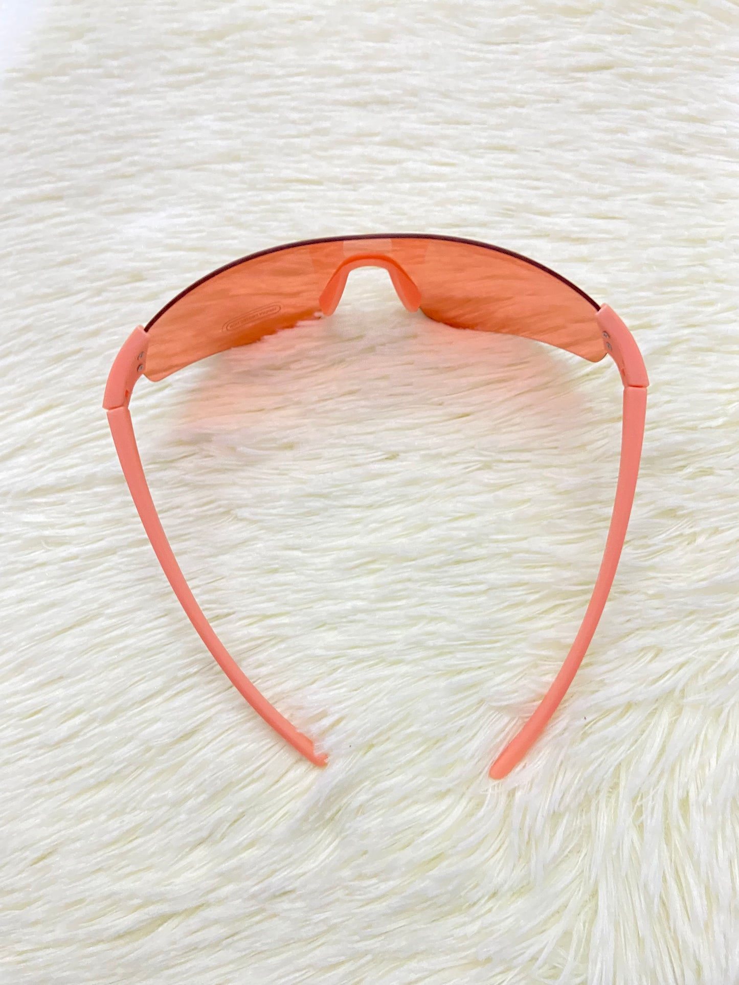 Lentes, naranja con montura color naranja pastel, protección UV  100 %.