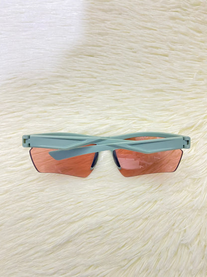 Lentes, verde sage con micas eñ color naranja transparente con protección UV  100%.