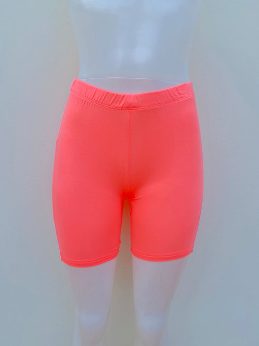 Legging/licra CHILLIPOP original, color naranja ( salmón ) con raya en color blanco al lado, bicicleta.