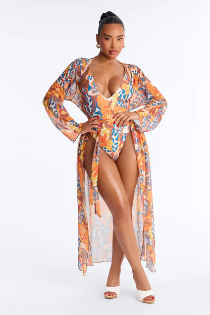 Biquini, marron con estampado de flores azules y amarillas, más cover Up largo.