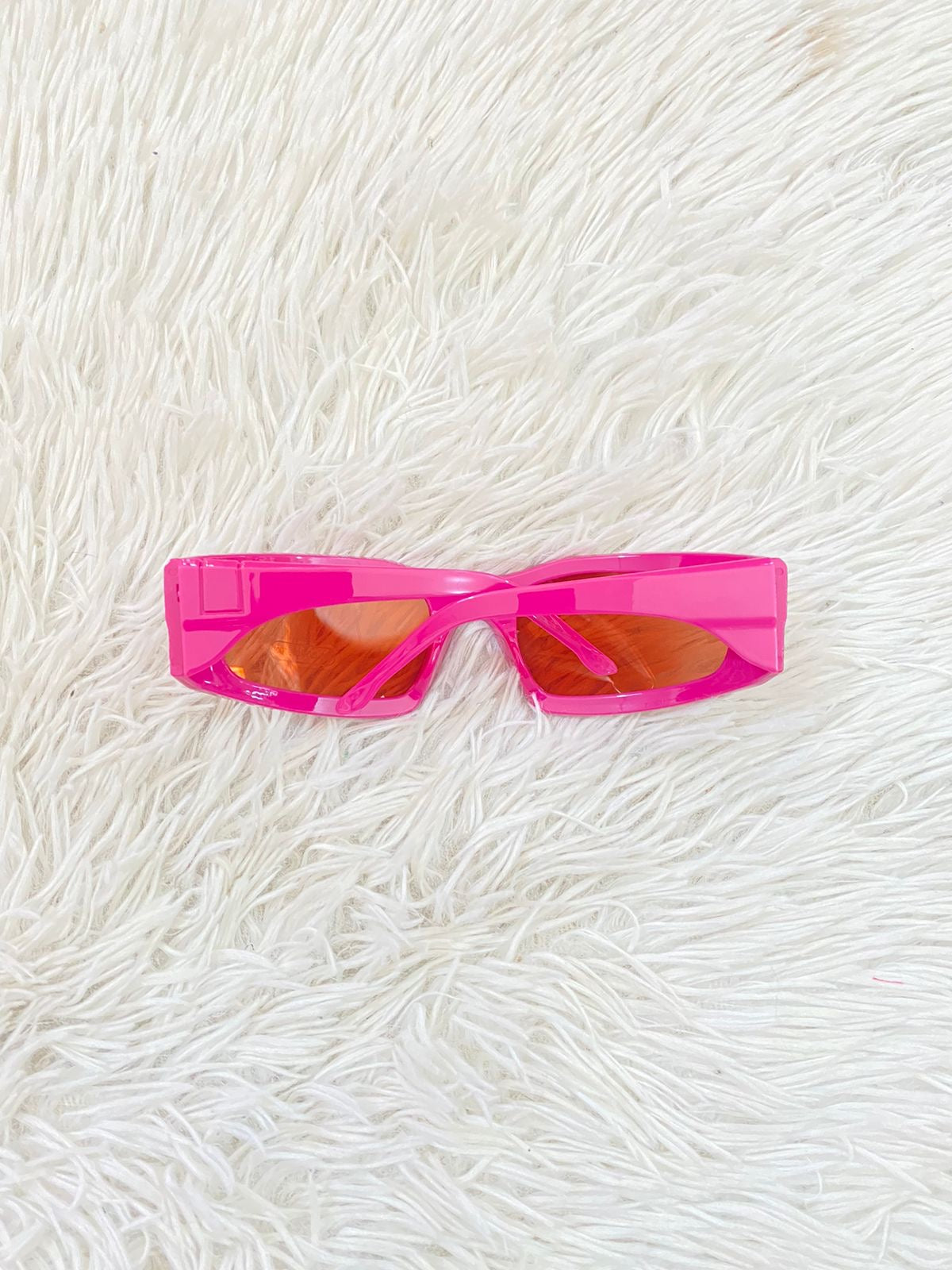 Lentes Fashion Nova original rosado fucsia con micas claras.