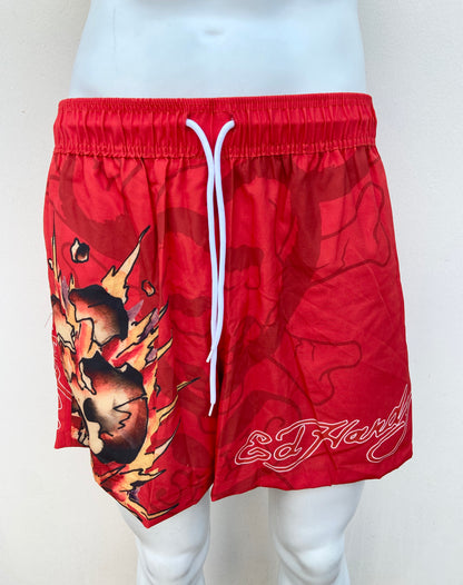 Bañador/Baggy, rojo con estampado de calavera y llamas.