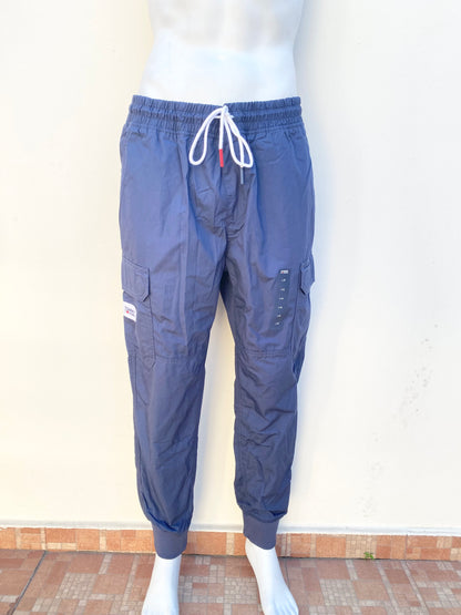 Jogger pantalón Tommy Hilfiger original azul con lazos blanco.