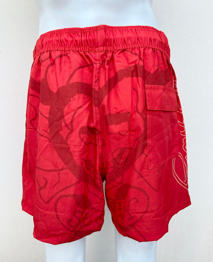 Bañador/Baggy, rojo con estampado de calavera y llamas.