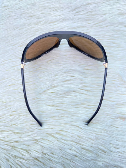 Lentes, marrones con micas en color  marrón claro, ovalados grandes.