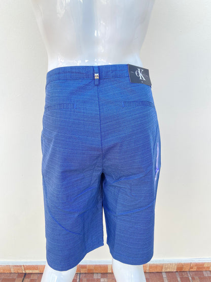 Bermuda CALVIN KLEIN original, azul marino con pequeños puntos blancos, 100% algodón.
