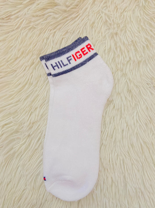 Medias Tommy Hilfiger original blanca, con raya azul arriba y letras HILFIGER.