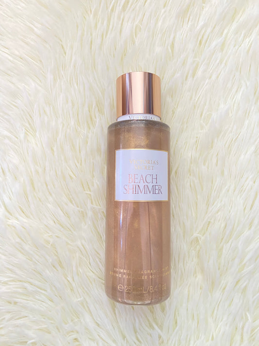Colonia Victoria’s Secret original, BEACH SHIMMER, marron con brillitos.