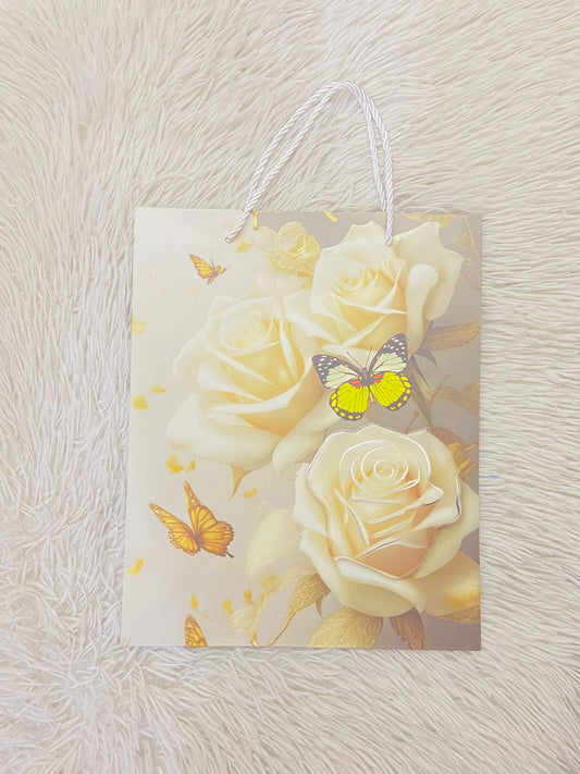 Shopping en color blanco y gris con estampado de flores y mariposas amarillas MEDIANO
