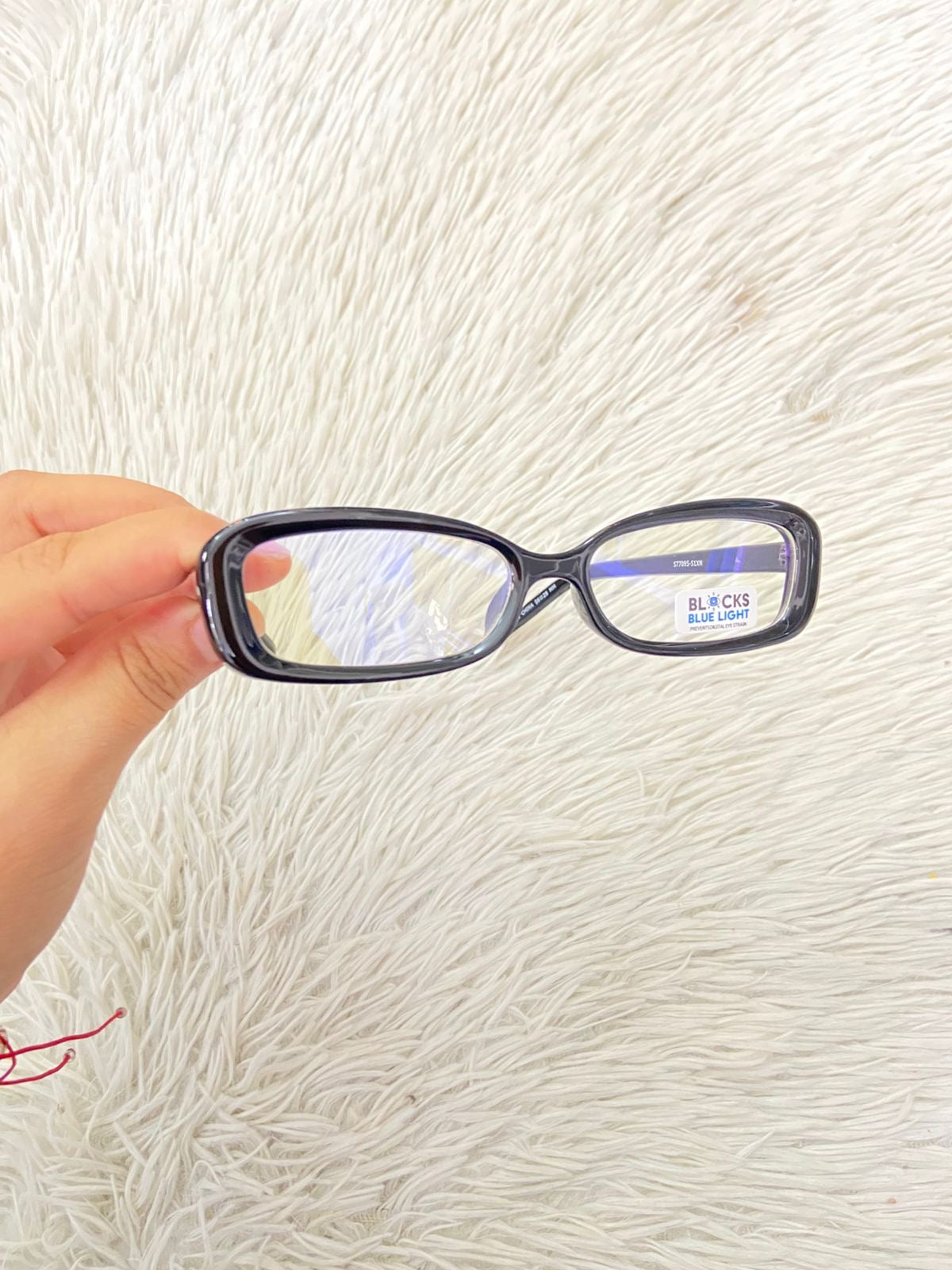 Lentes negros con montura negra, micas azules