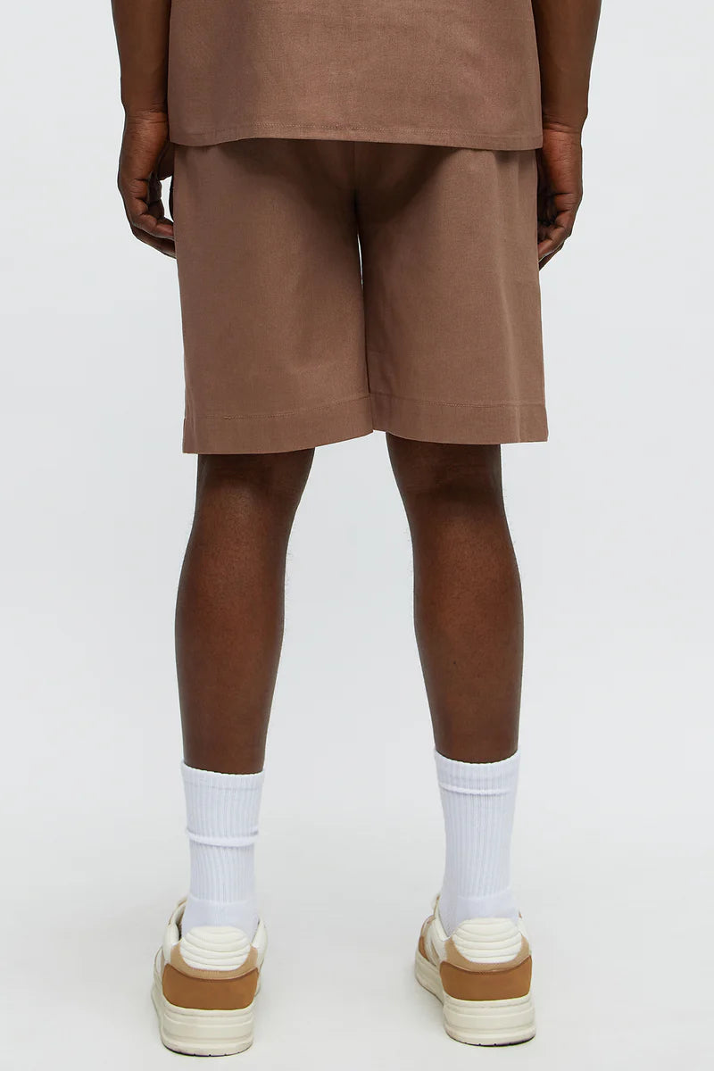 Bermuda en color marron lisa en lino