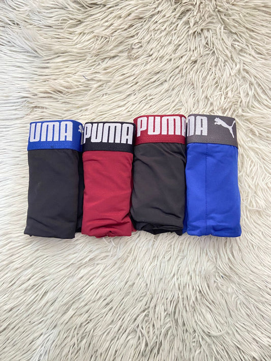 Pack-4 Boxer PUMA original, en colores azul, negro y rojo.