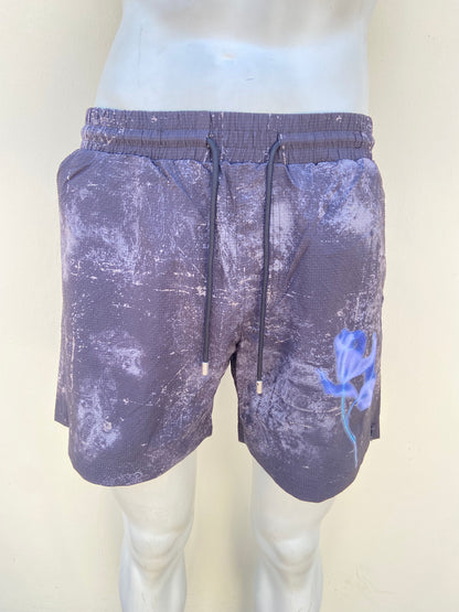 Bañador/ Baggy, negro con detalles en color azul y lazos ajustables.