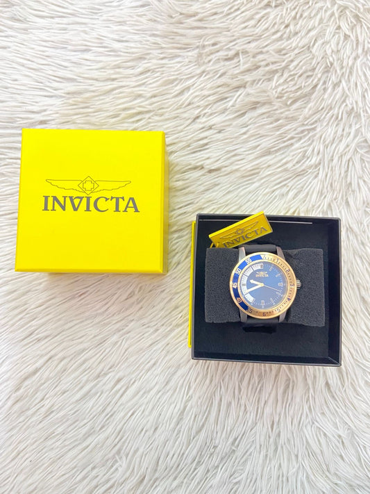 Reloj INVICTA original, negro con fondo en azul marino y turquesa, con manecillas  en blanco.