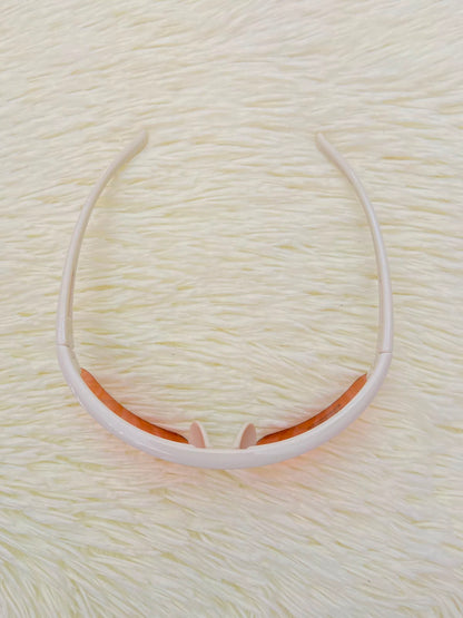 Lentes, naranja con montura en color crema y micas naranja, con preparación UV 100%.