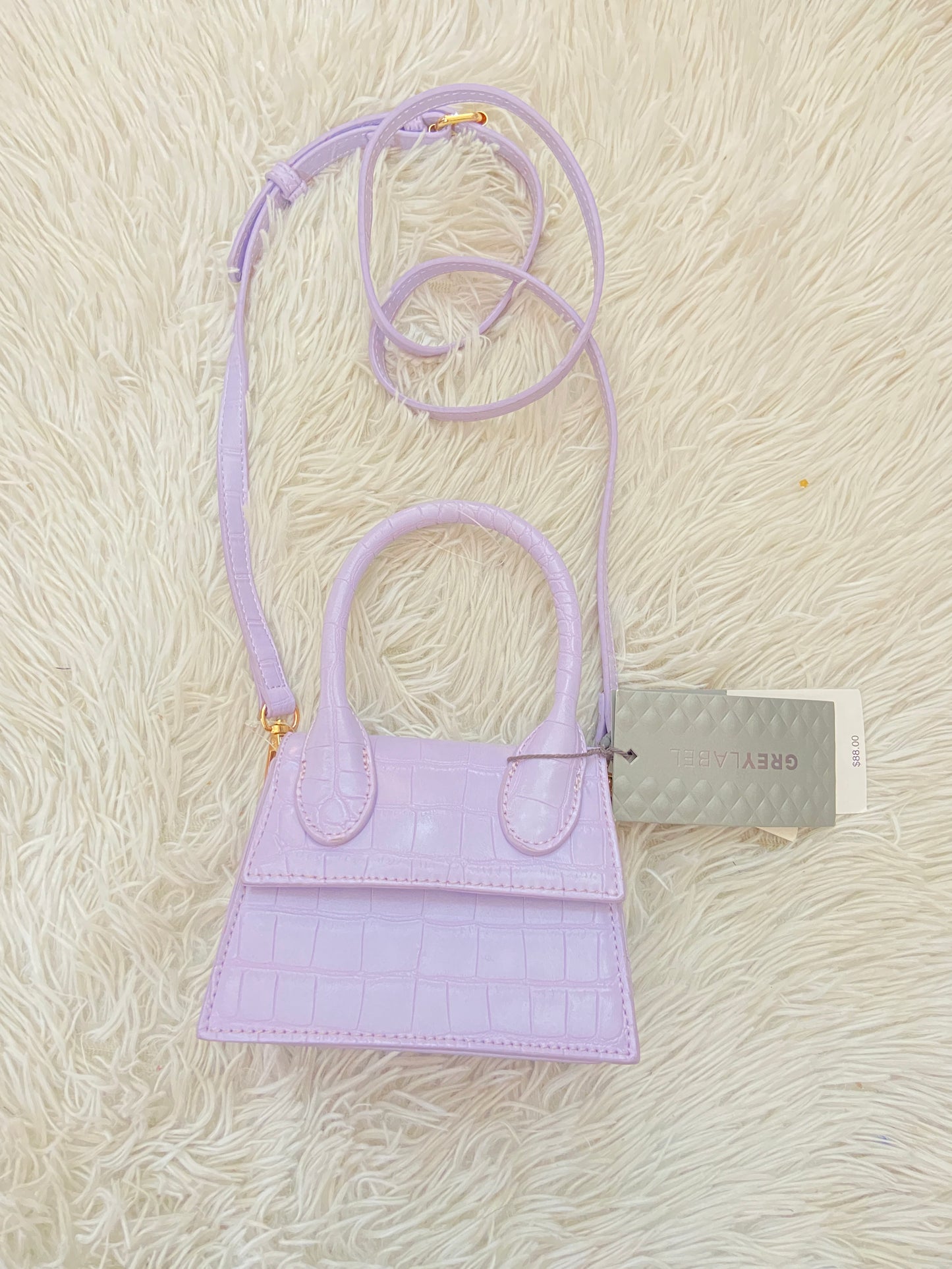 Cartera/ Crossbody GREYLABEL original morado lila ( lavanda ), pequeña con lazo adicional.