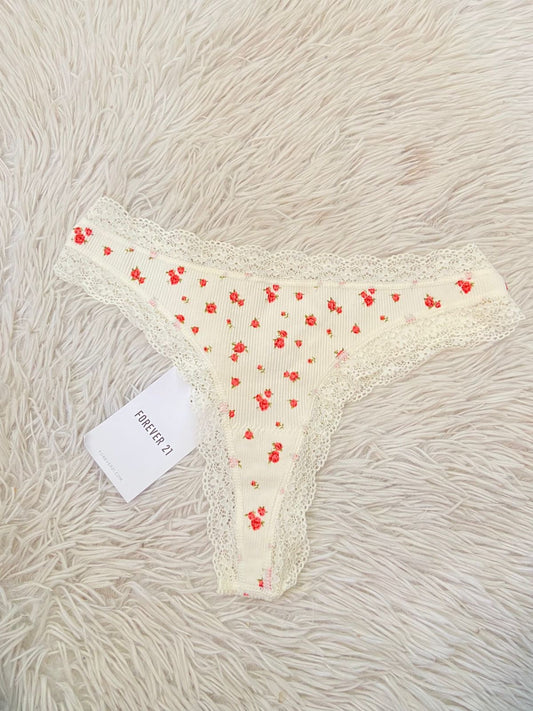 Panti Forever 21 original crema con estampado de flores rojas, tanga.