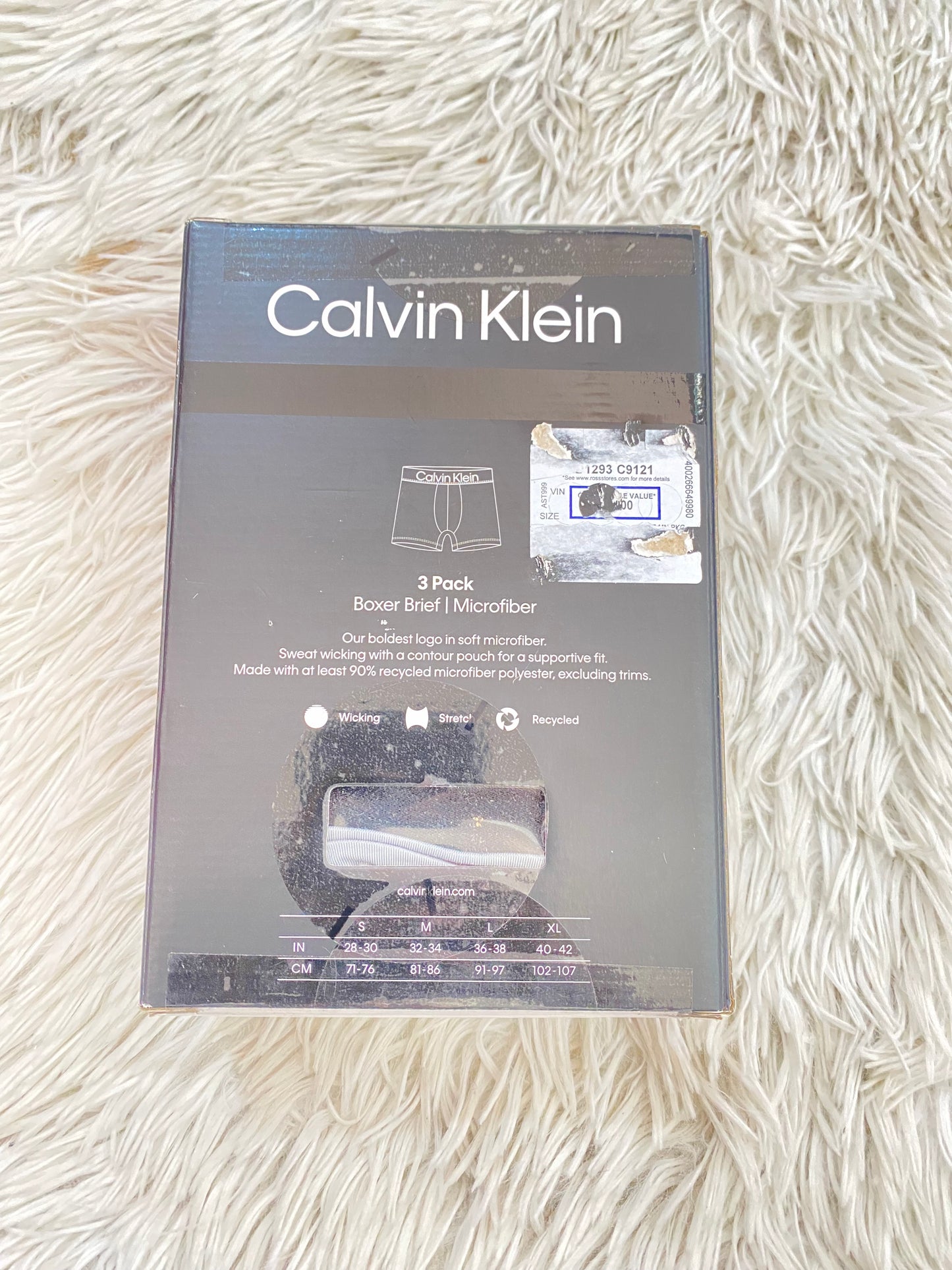 Boxer Calvin Klein original, pack de 3, diferentes colores neutros y letras de la marca en la parte superior.