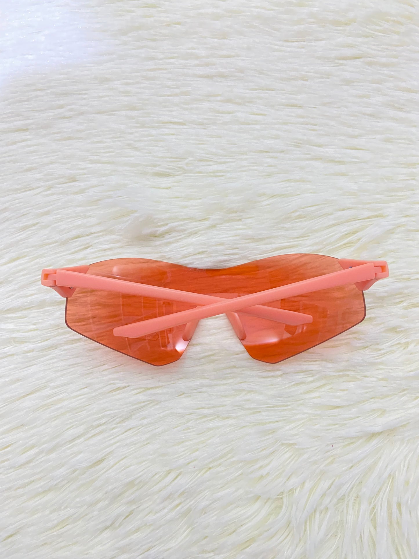Lentes, naranja con montura color naranja pastel, protección UV  100 %.