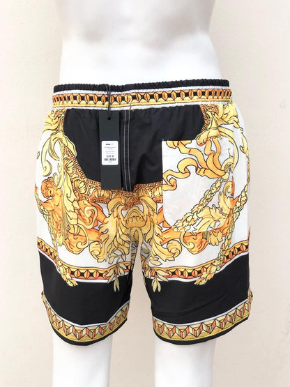 Bañador/Baggy, blanco con negro y diseño de cadenas dorada.
