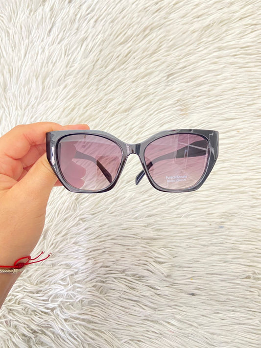 Lentes negros con montura redonda y micas oscura Grande