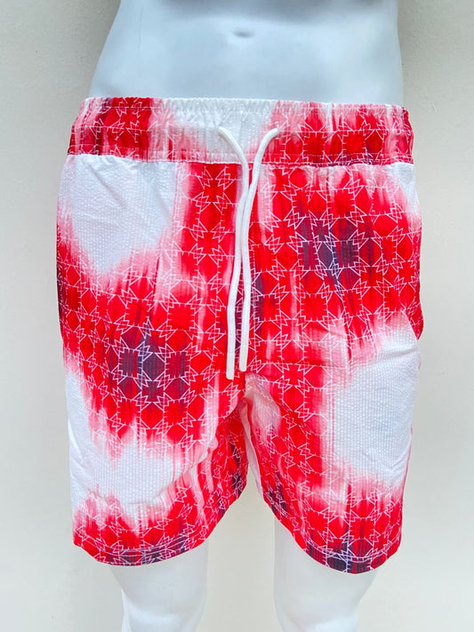 Bañador Baggy en color rojo con degradado blanco lazo ajustable blanco y bolsillo atras.