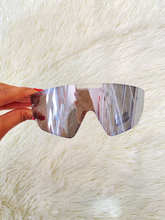 Lentes, plateados grandes con montura transparente, 100 % Polycarbonate y protección UV.