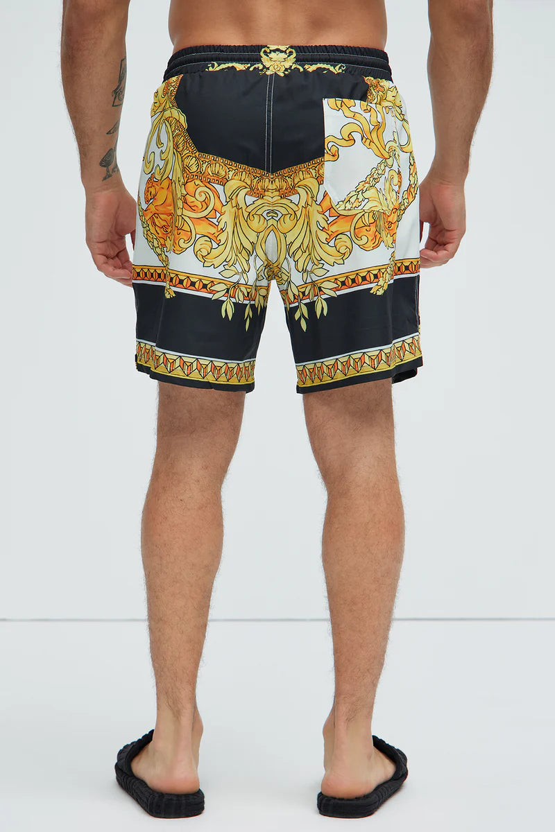 Bañador/Baggy, blanco con negro y diseño de cadenas dorada.