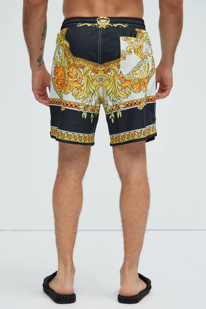 Bañador/Baggy, blanco con negro y diseño de cadenas dorada.