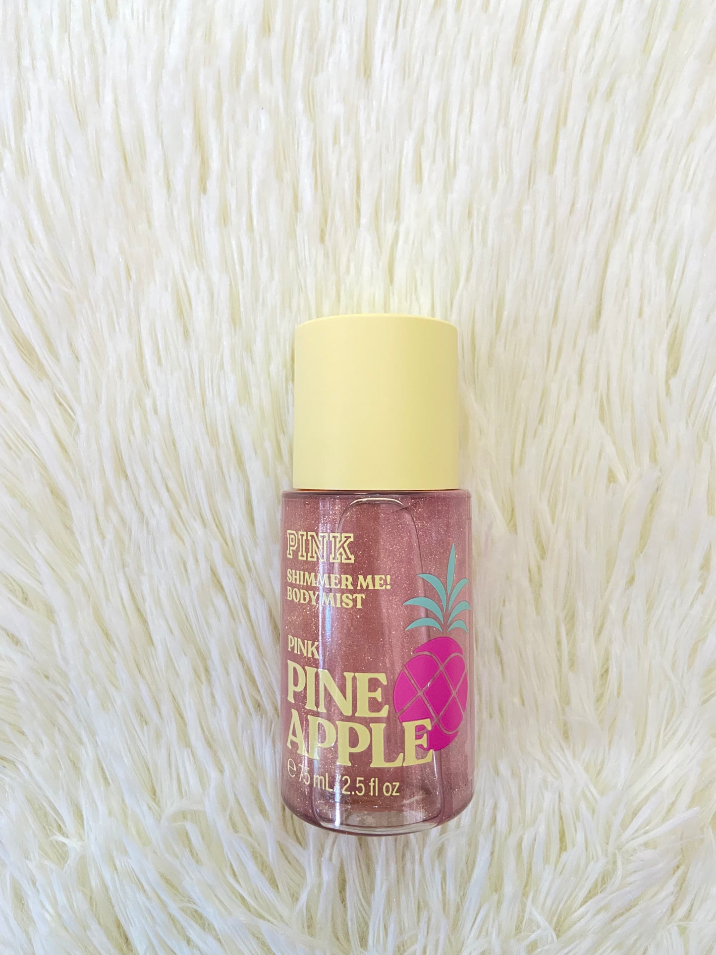 Pack PINK original, de tres colonia, aceite y crema minis PINEAPPLE,con brillitos. Más el bolso