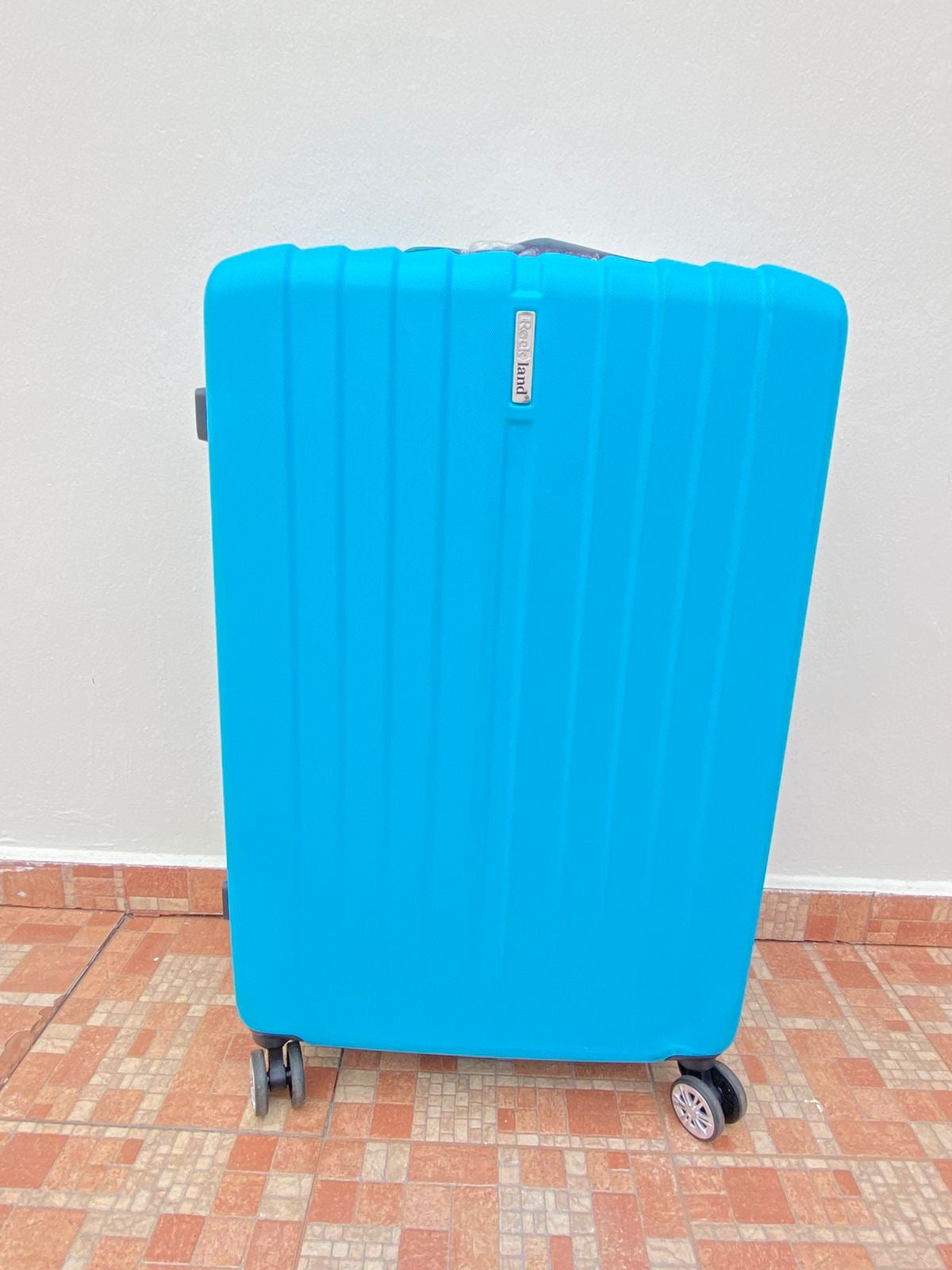 Maleta ROCKLAND original, azul claro lisa, GRANDE.