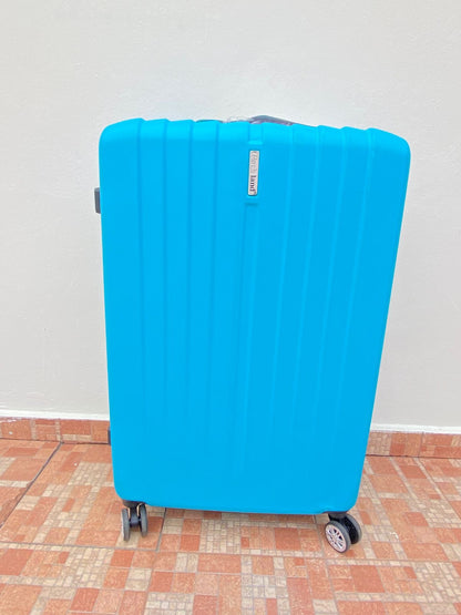 Maleta ROCKLAND original, azul claro lisa, GRANDE. Material ABS resistente al agua.  Asa telescópica ajustable