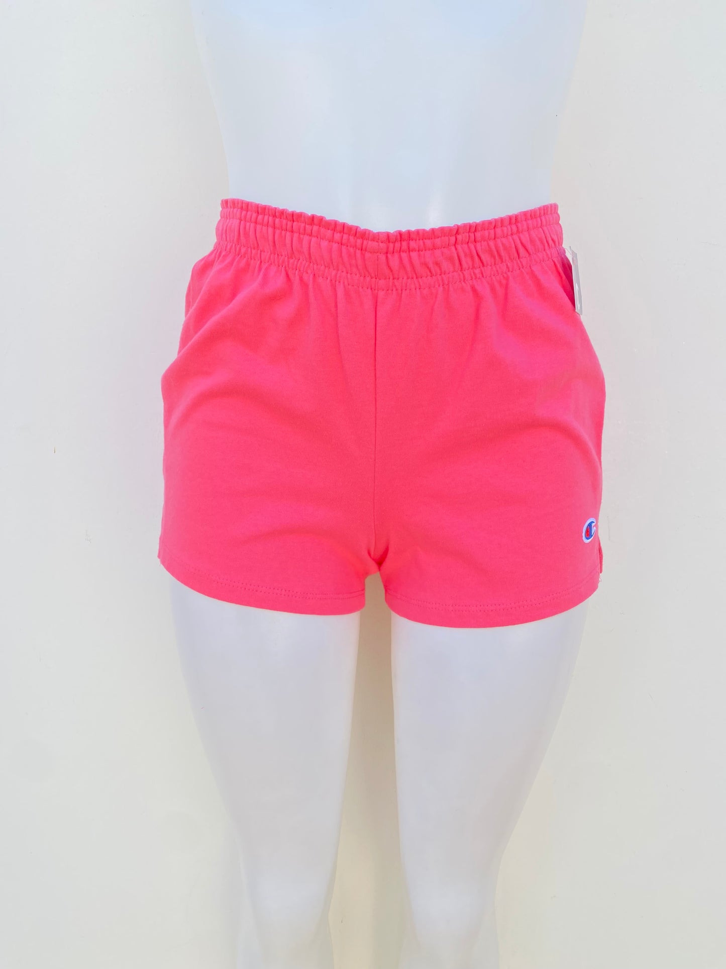 Short Champion original, Rosado con la marca en azul.