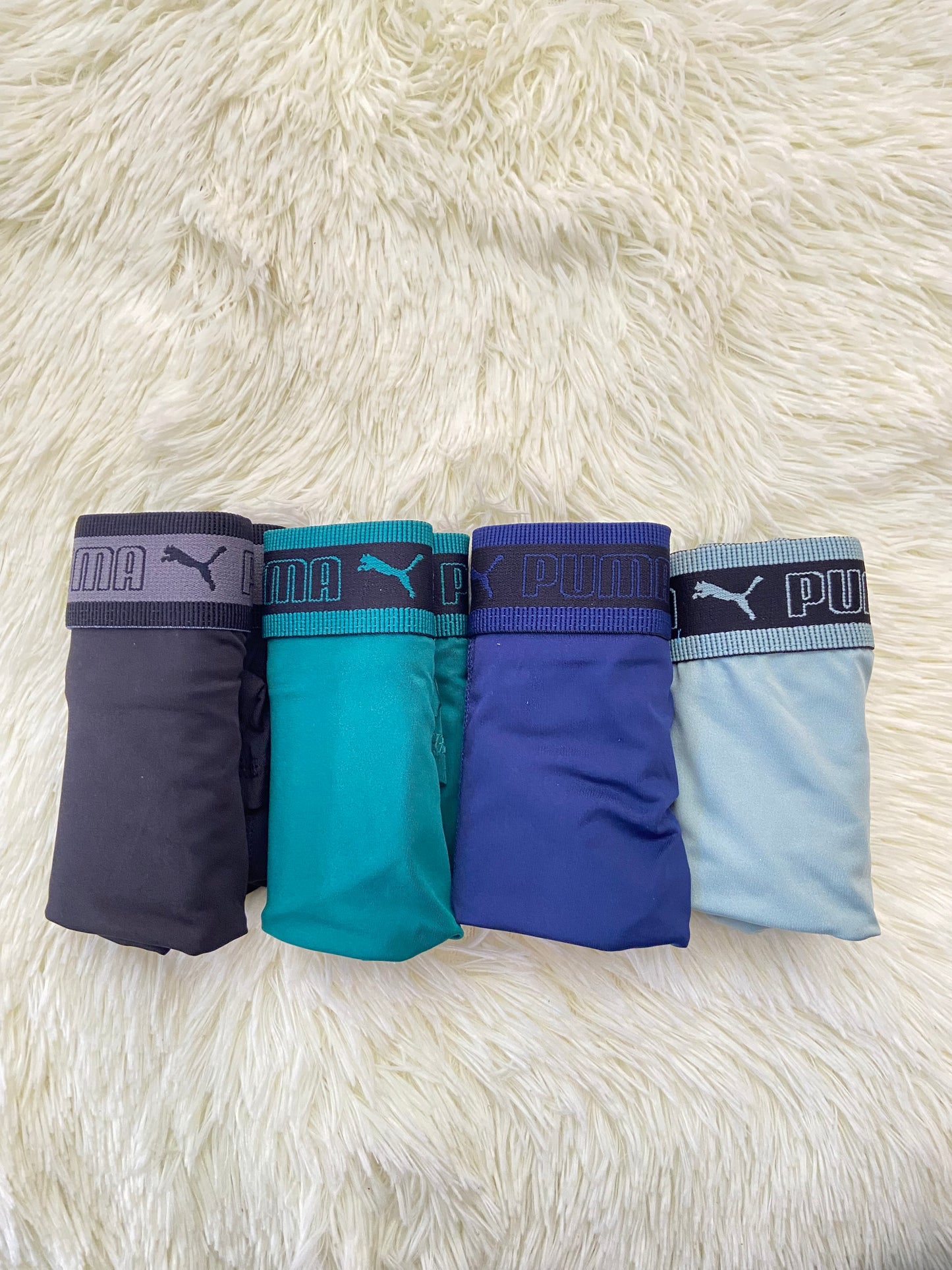 Pack-4 Boxer PUMA original, en colores negro, verde,azul marino y azul claro.