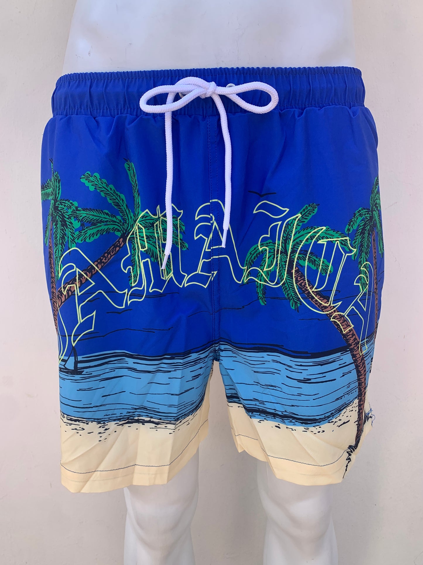 Bañador Baggy Nova Men original, Azul con letras amarillas al frente y estampado de playa