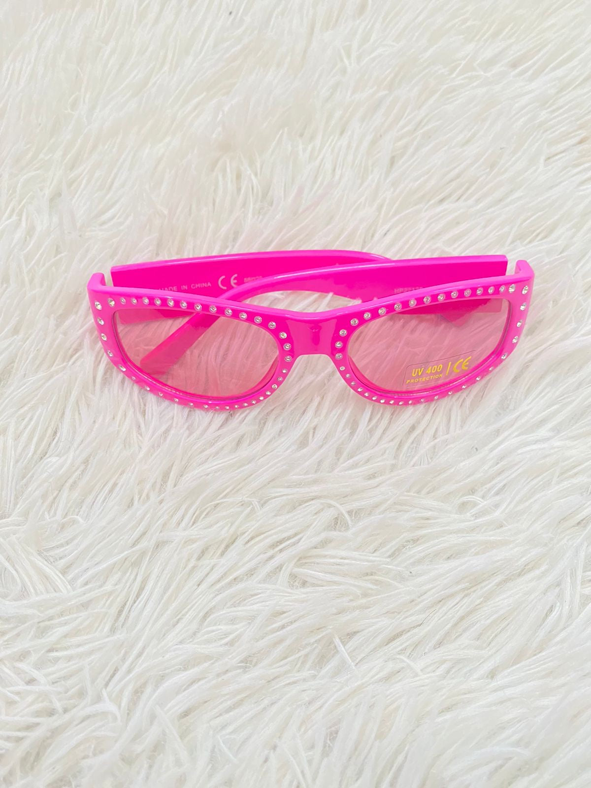 Lentes Fashion Nova original rosado con puntos plateados.