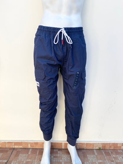 Jogger pantalón Tommy Hilfiger original azul con lazos blanco.