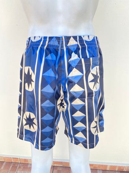 Bañador/Baggy, azul marino con crema y estampado de figuras.