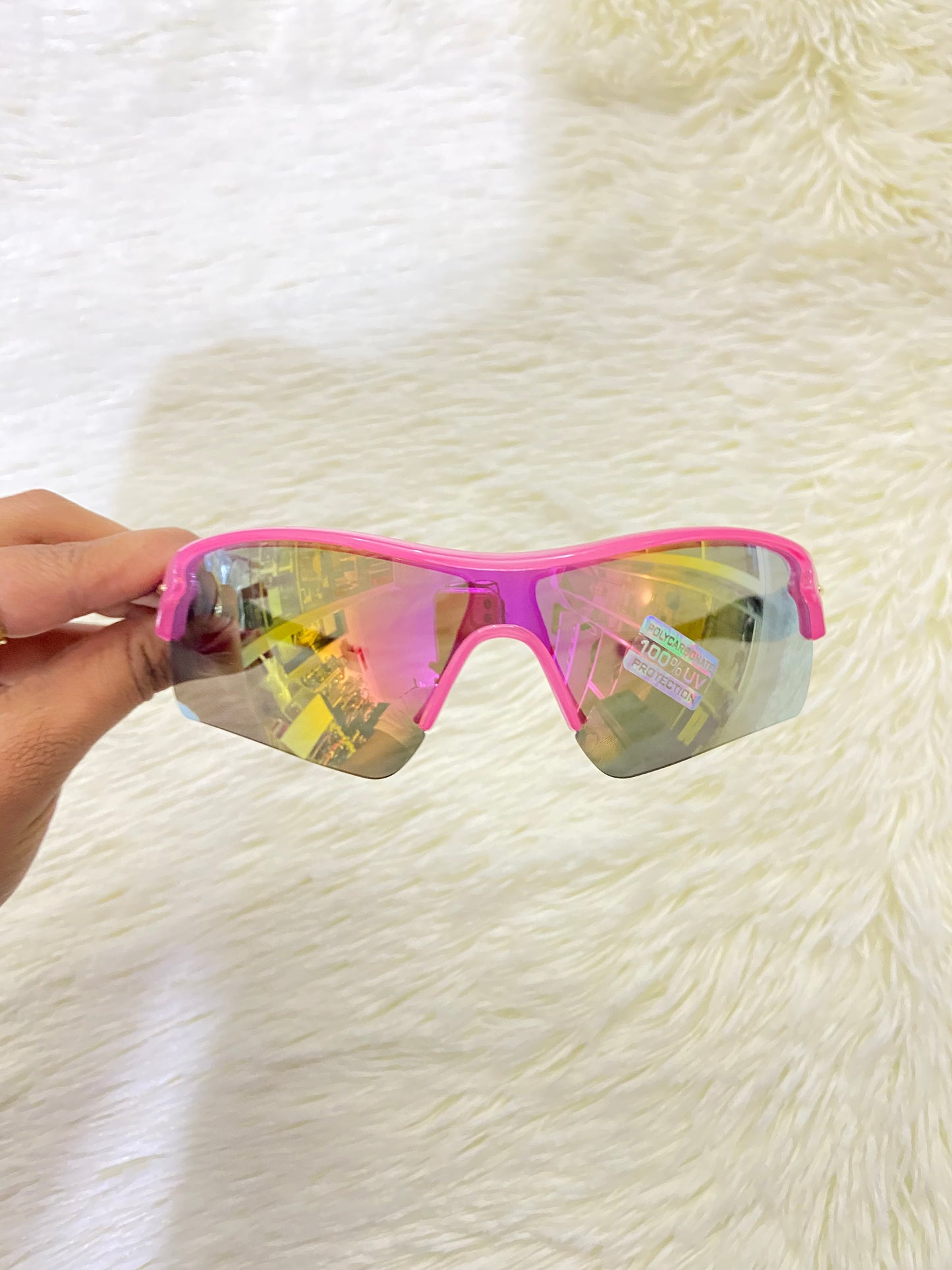 Lentes, rosados con negros y micas que cambian de color, con 100 % Polycarbonate y protección UV.