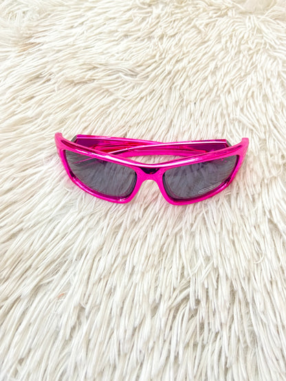 Lentes diseñados con protección UV 100-400 para proteger tu visión. Rosado metálico, micas oscuras.