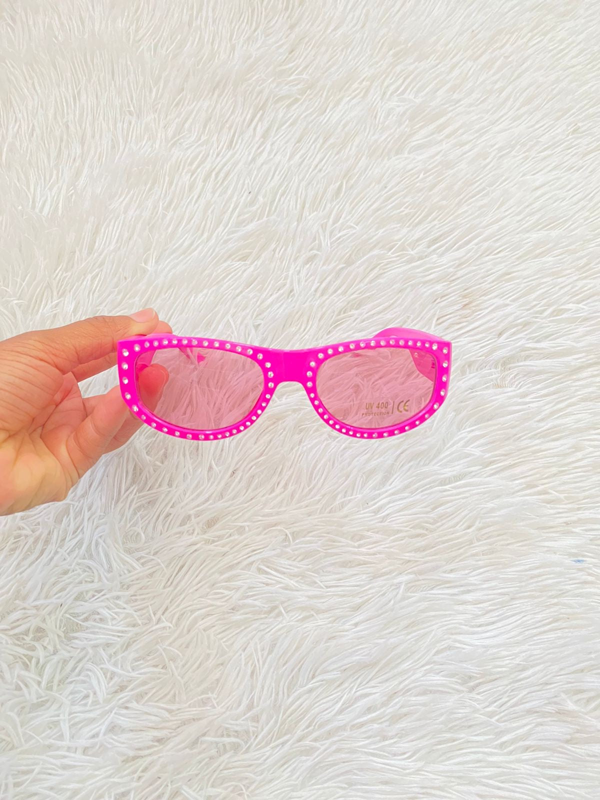 Lentes Fashion Nova original rosado con puntos plateados.