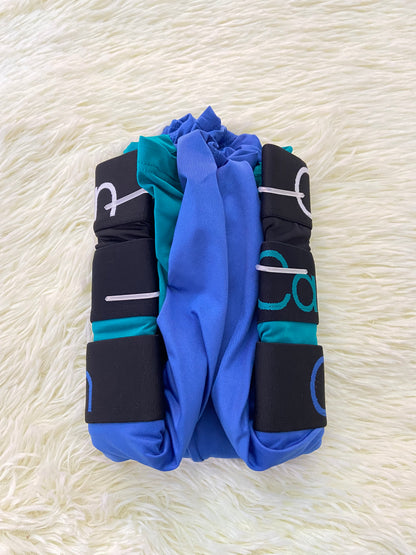 Pack-3 Boxer CALVIN KLEIN original, azul, verde Aqua y  negro con letras de la marca en la pretina.