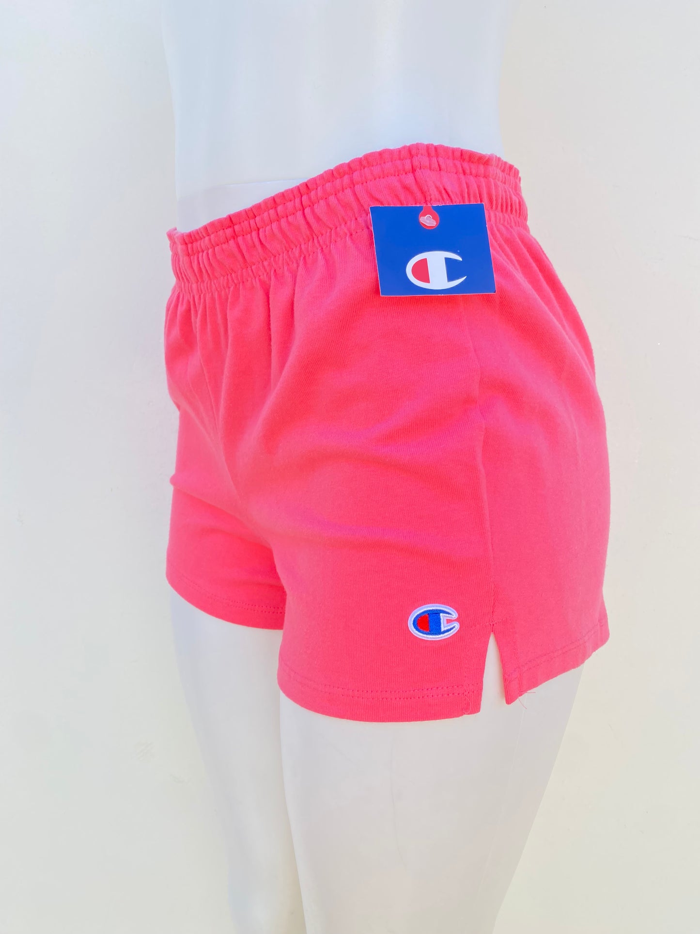 Short Champion original, Rosado con la marca en azul.