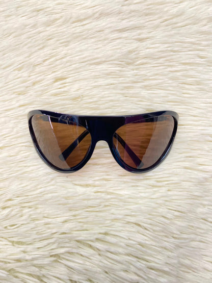Lentes, marrones con micas en color  marrón claro, ovalados grandes.