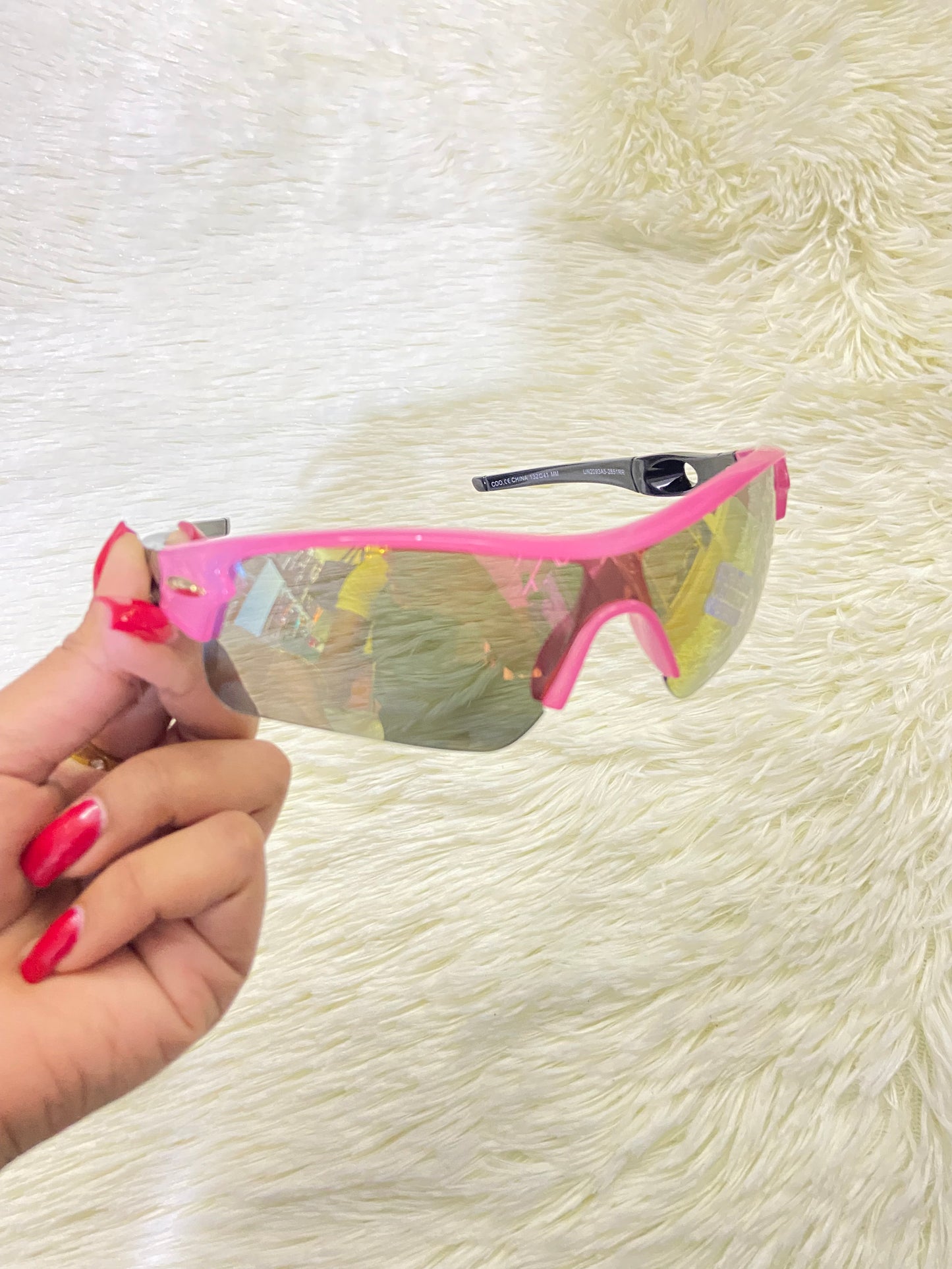 Lentes, rosados con negros y micas que cambian de color, con 100 % Polycarbonate y protección UV.