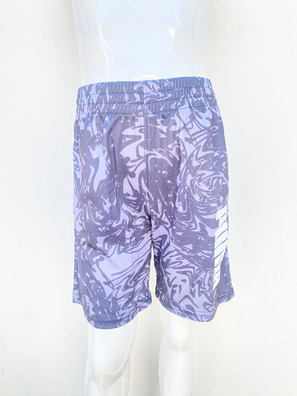 Bermuda niños Puma original, negra con gris, con letras de la marca en blanco.