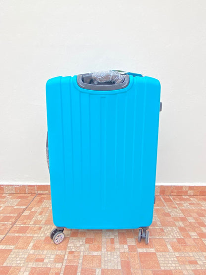 Maleta ROCKLAND original, azul claro lisa, GRANDE. Material ABS resistente al agua.  Asa telescópica ajustable