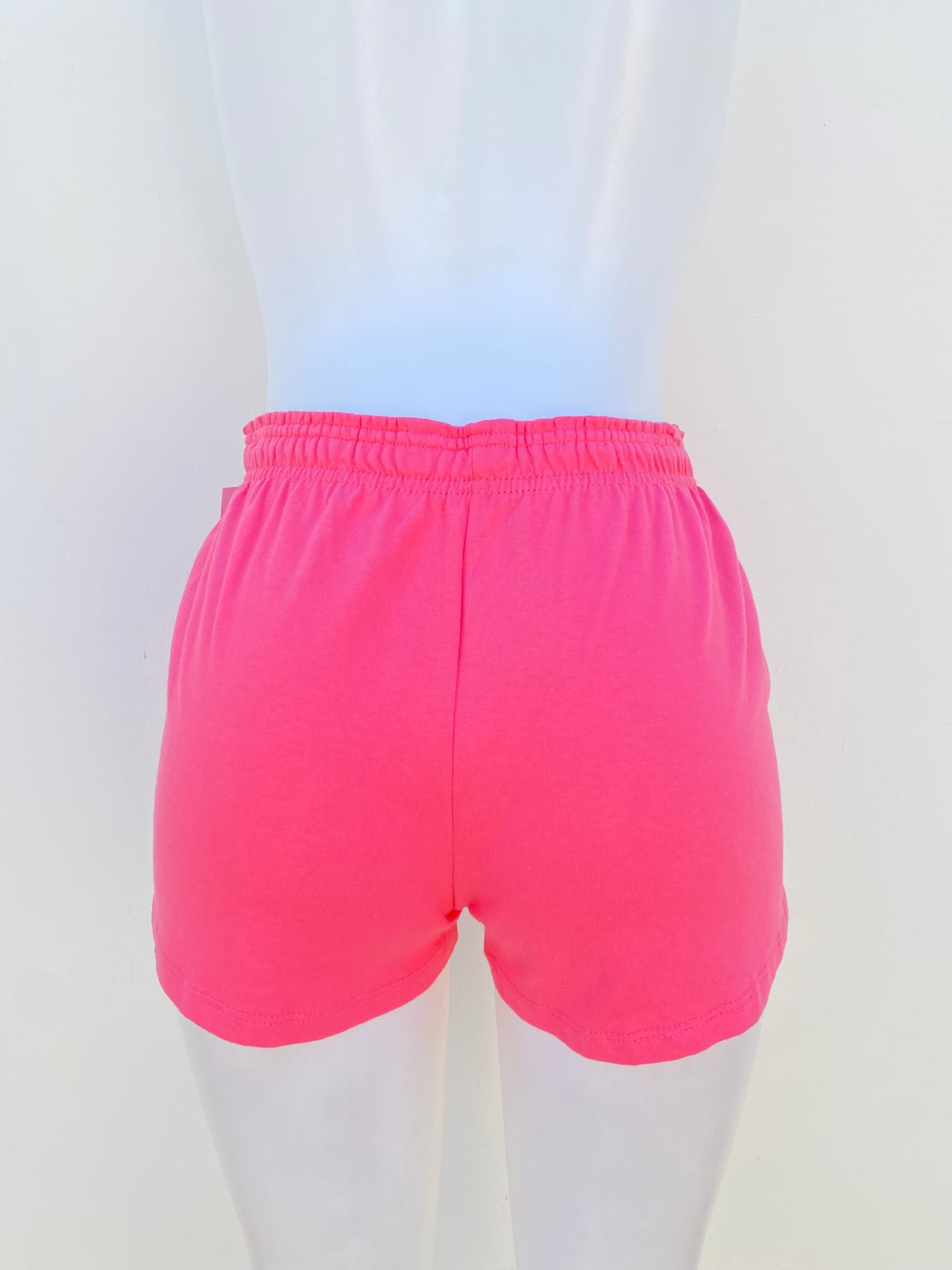 Short Champion original, Rosado con la marca en azul.