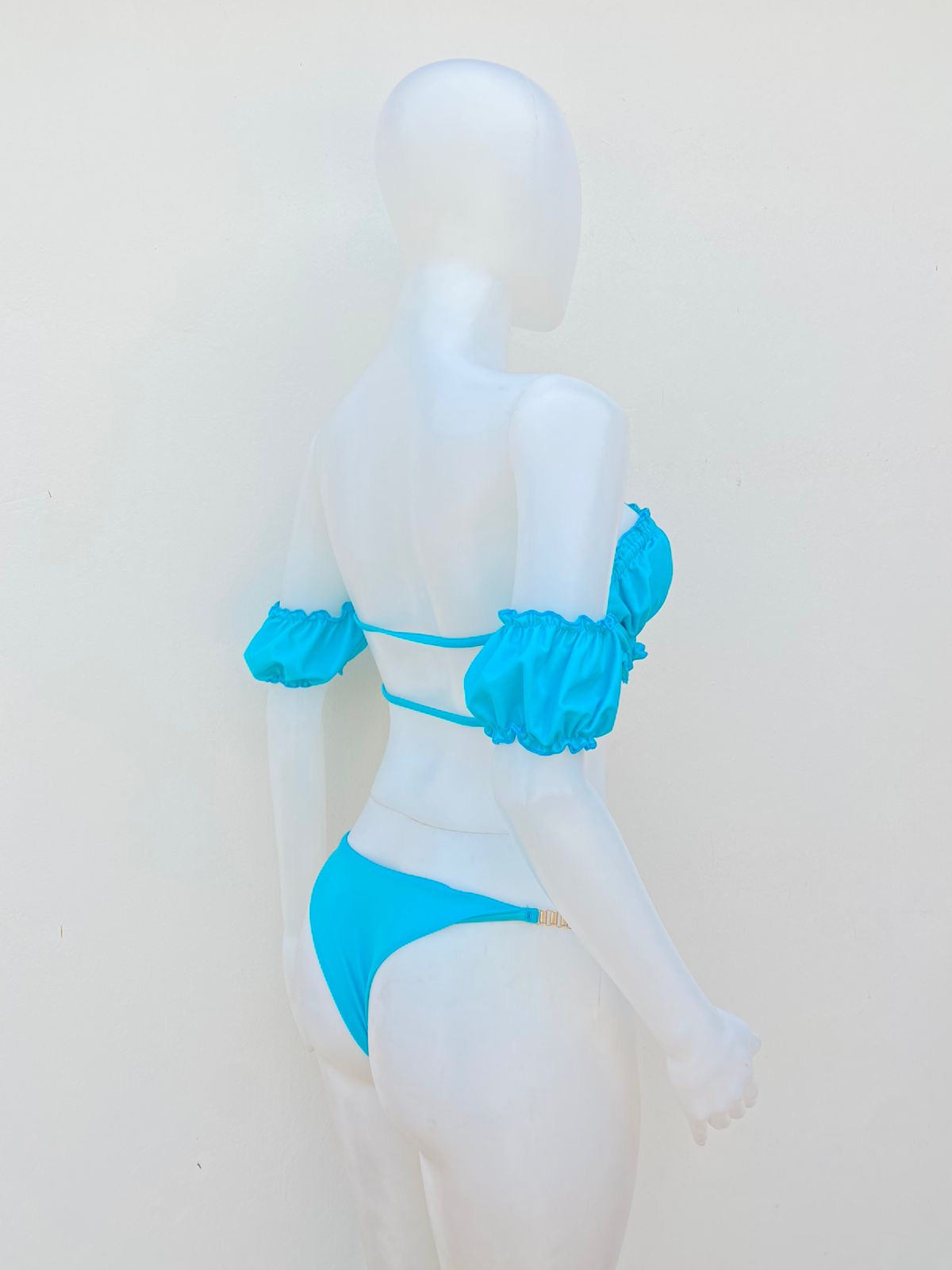 Biquini Mermaid Swimwear original azul turquesa con detalles dorado.