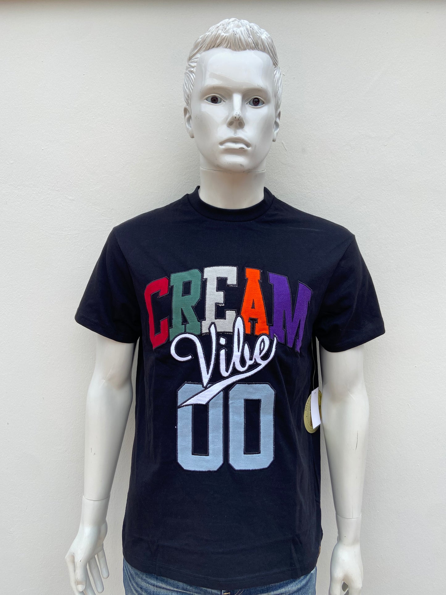T-shirt BILLION DOLLAR COIN original, negro con letras CREAM VIBE 00 en colores.